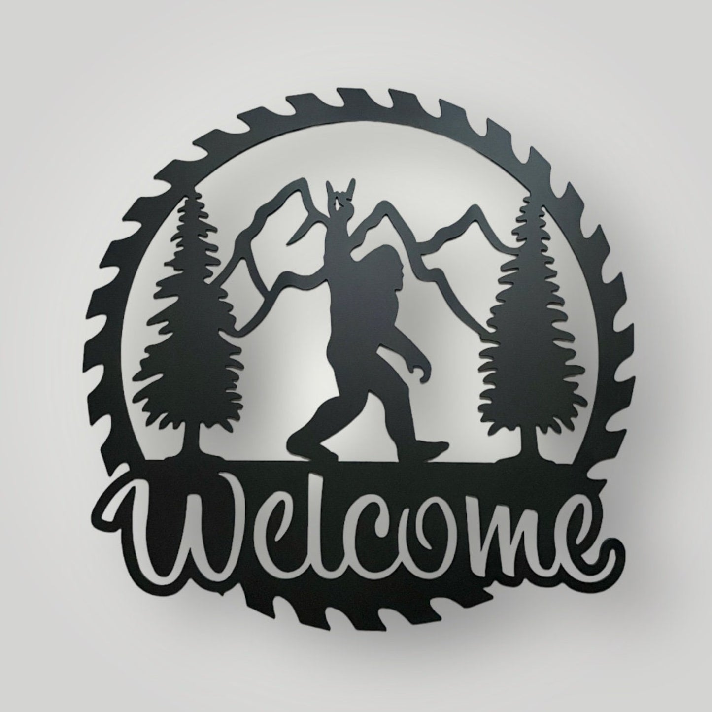 Metal Saw blade design with Bigfoot and the word welcome