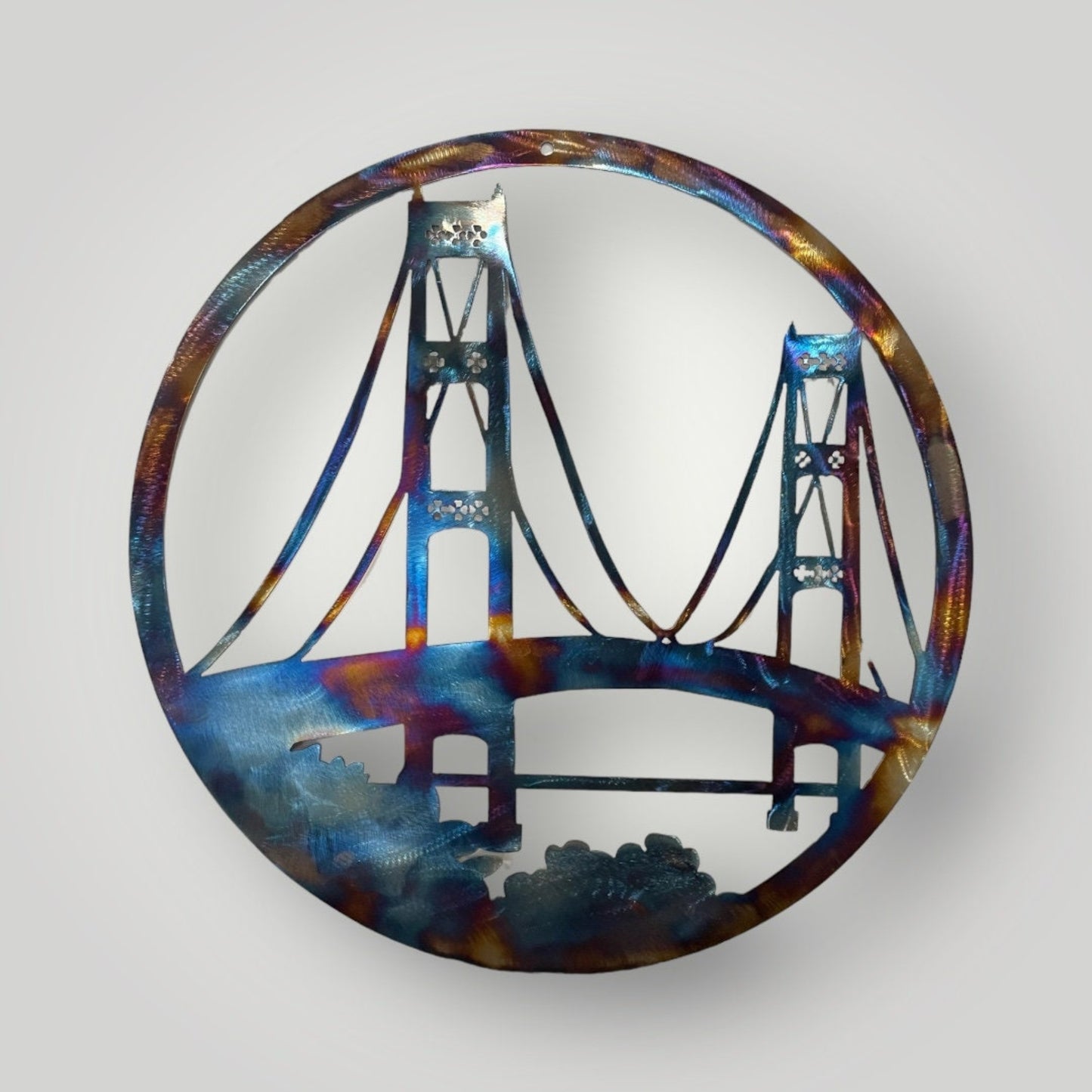 Mackinac Bridge within a circle metal band multicolored