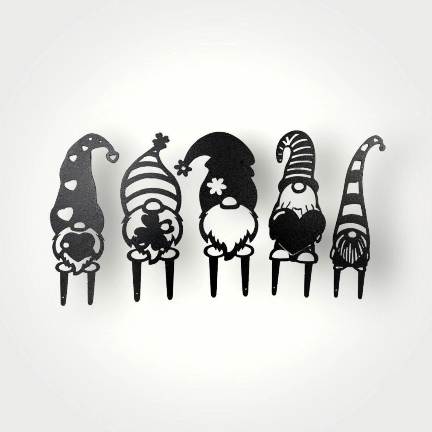 Little metal garden gnomes with cute designs