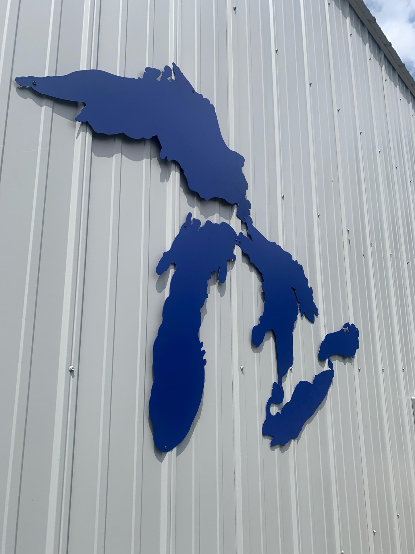 Side angel of large 6-foot Great Lakes metal wall art