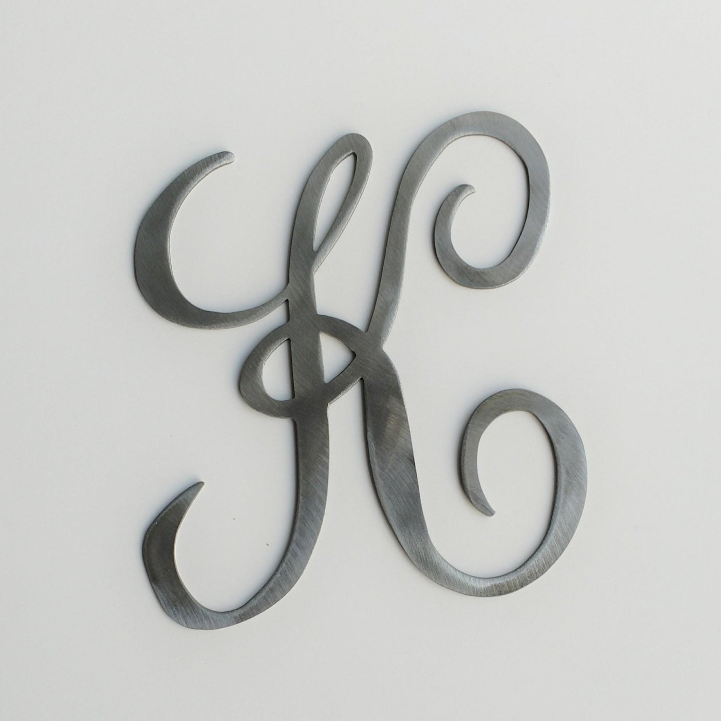 The letter K cursive monogram letter
