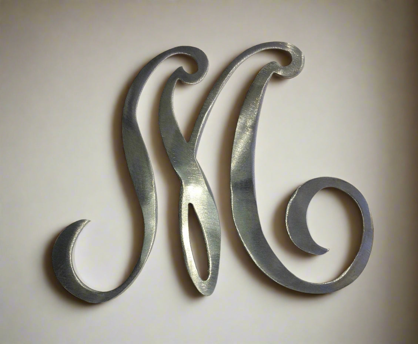 The letter M metal wall monogram