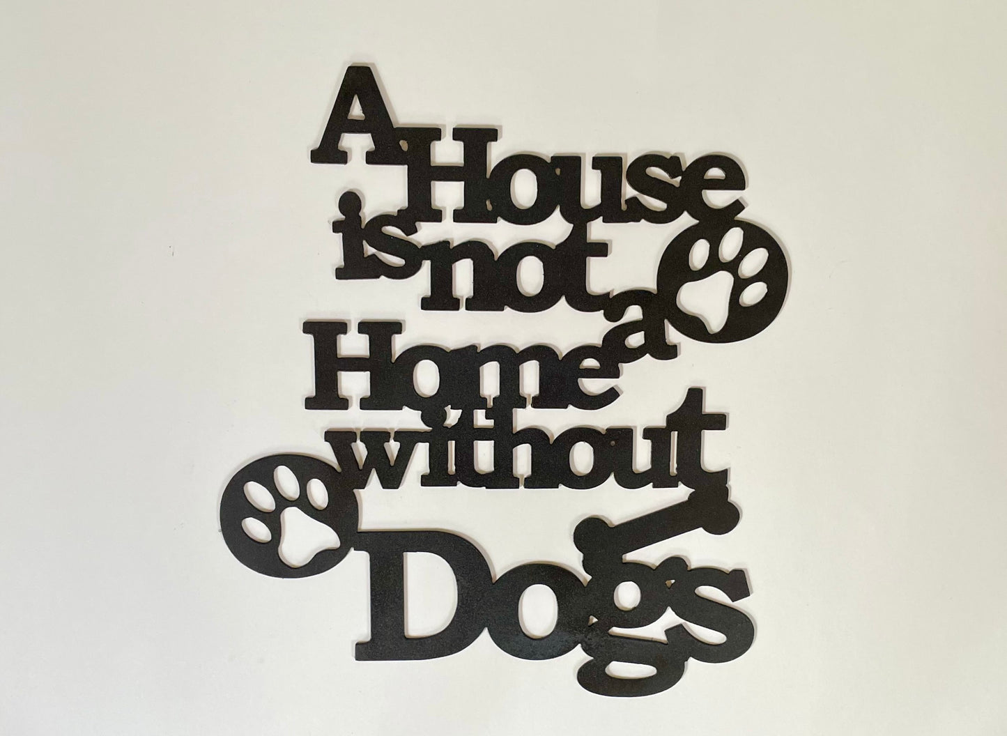 A house is not a home without dogs or cats metal wall sign