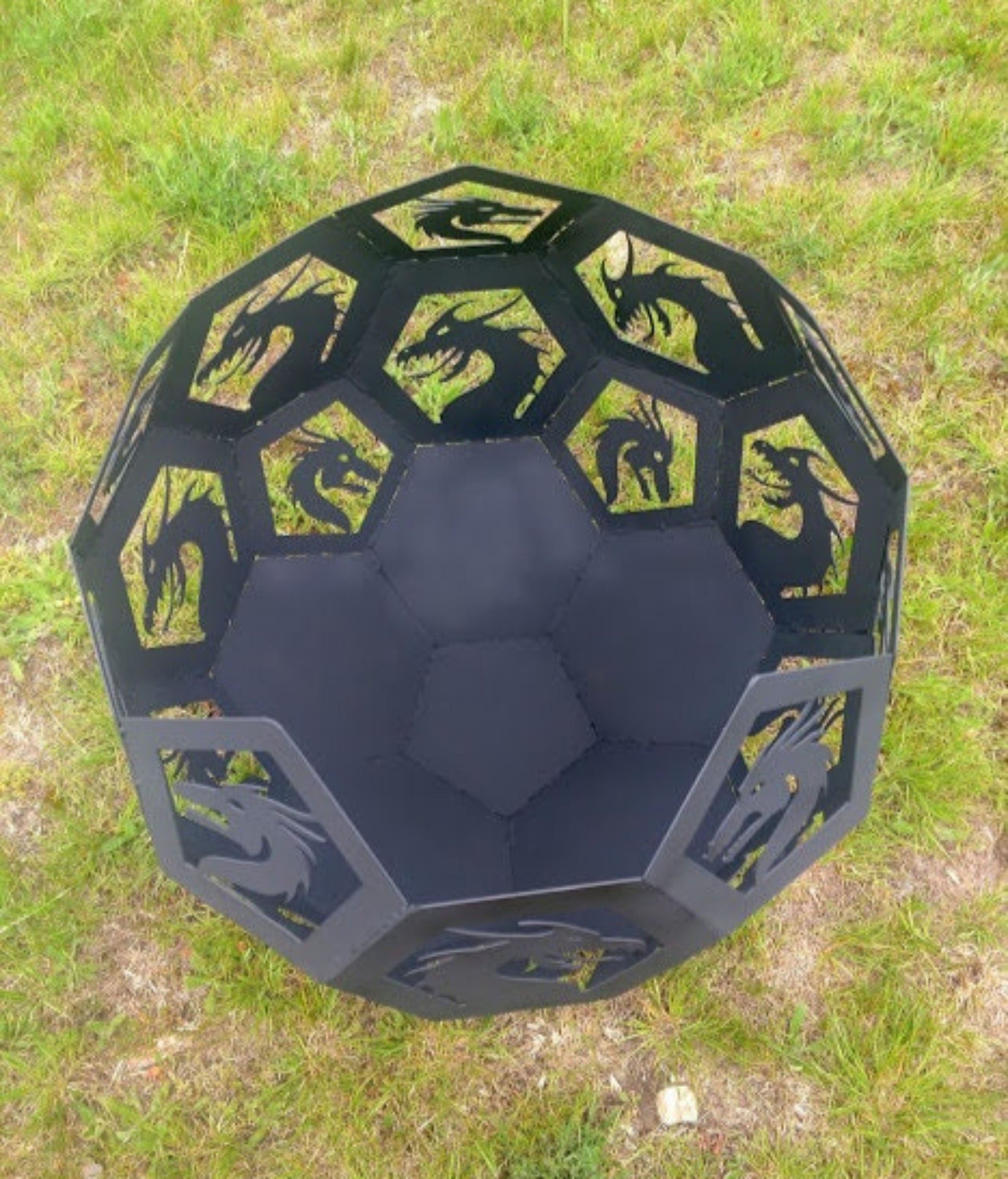fire breathing dragon themed fire pit.  top view