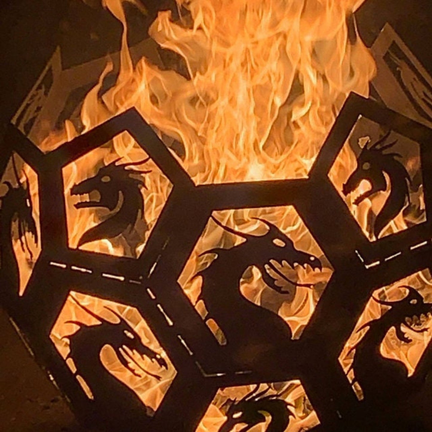 Fire breathing dragon fire pit with fire