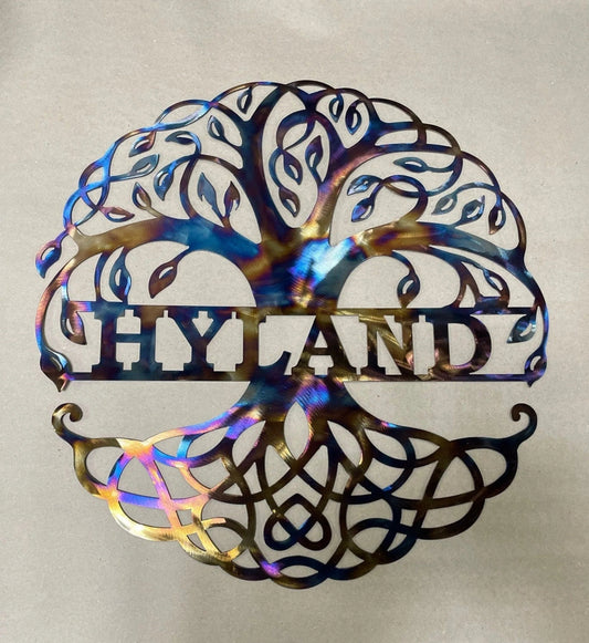 Metal multicolored tree with name in the middle