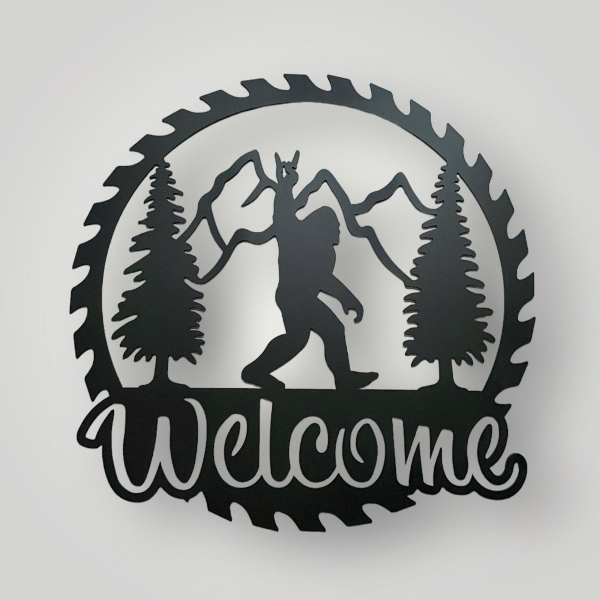 Metal Saw blade design with Bigfoot and the word welcome