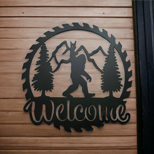 Bigfoot with rock and roll fingers with trees and mountains metal sign saw blade design