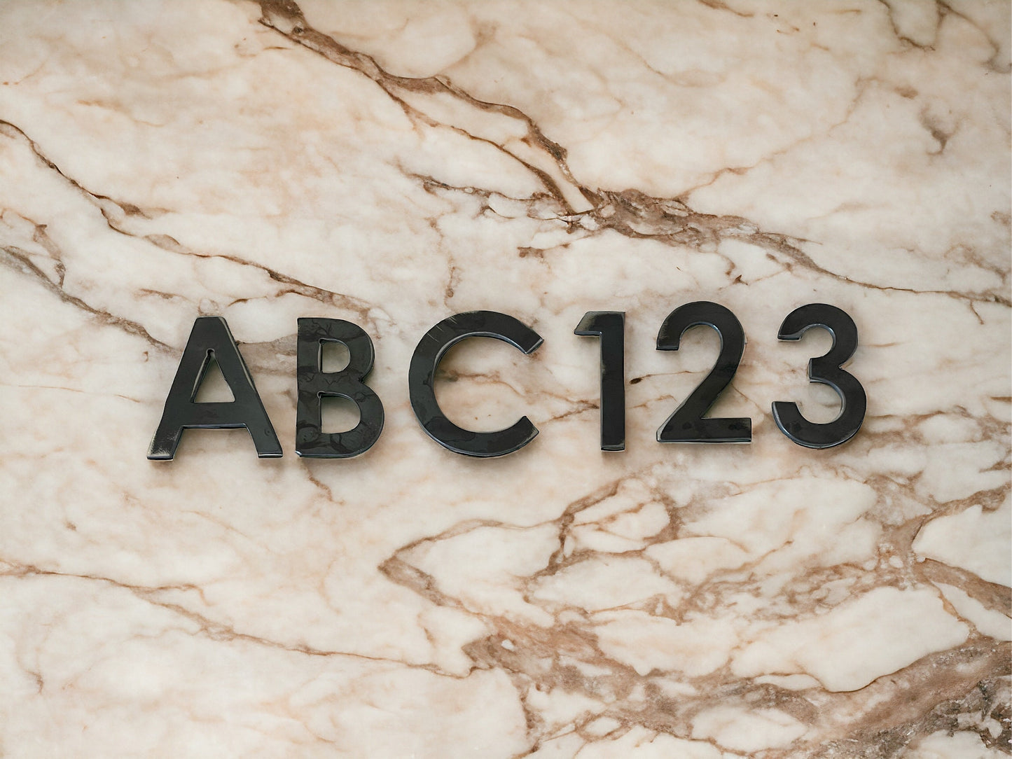 1/16" Century Gothic Bold Metal Letters & Numbers - Powder Coated or Unpainted