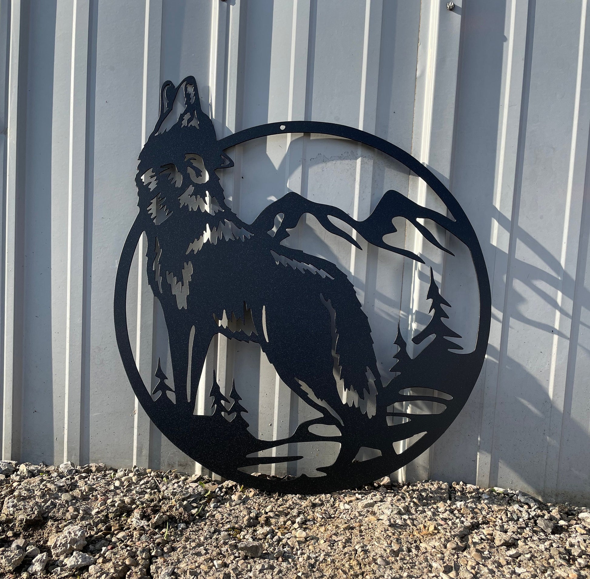 Metal wall decor black wolf howling at the moon in mountain and tree scene
