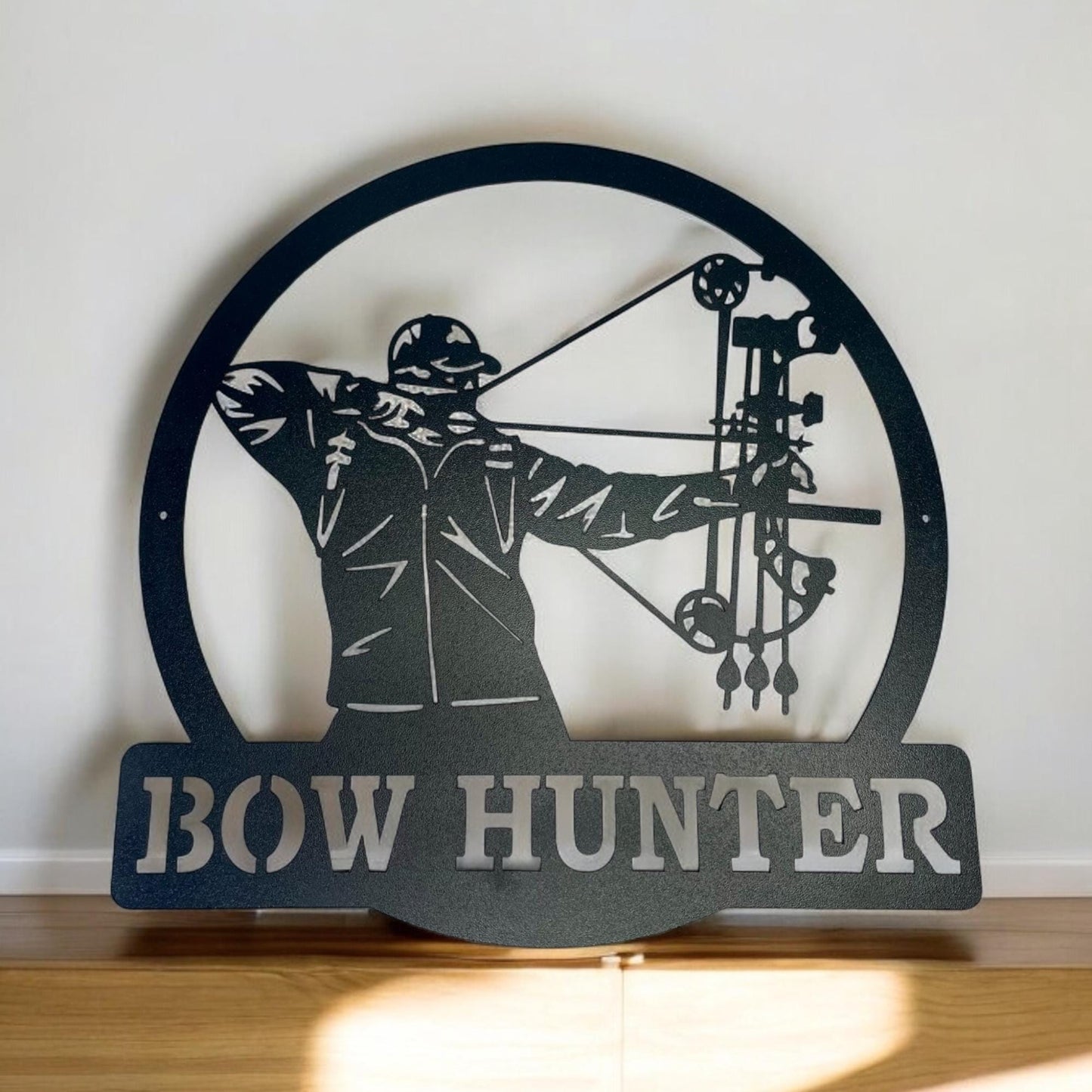 Bow hunter with compound bow metal art