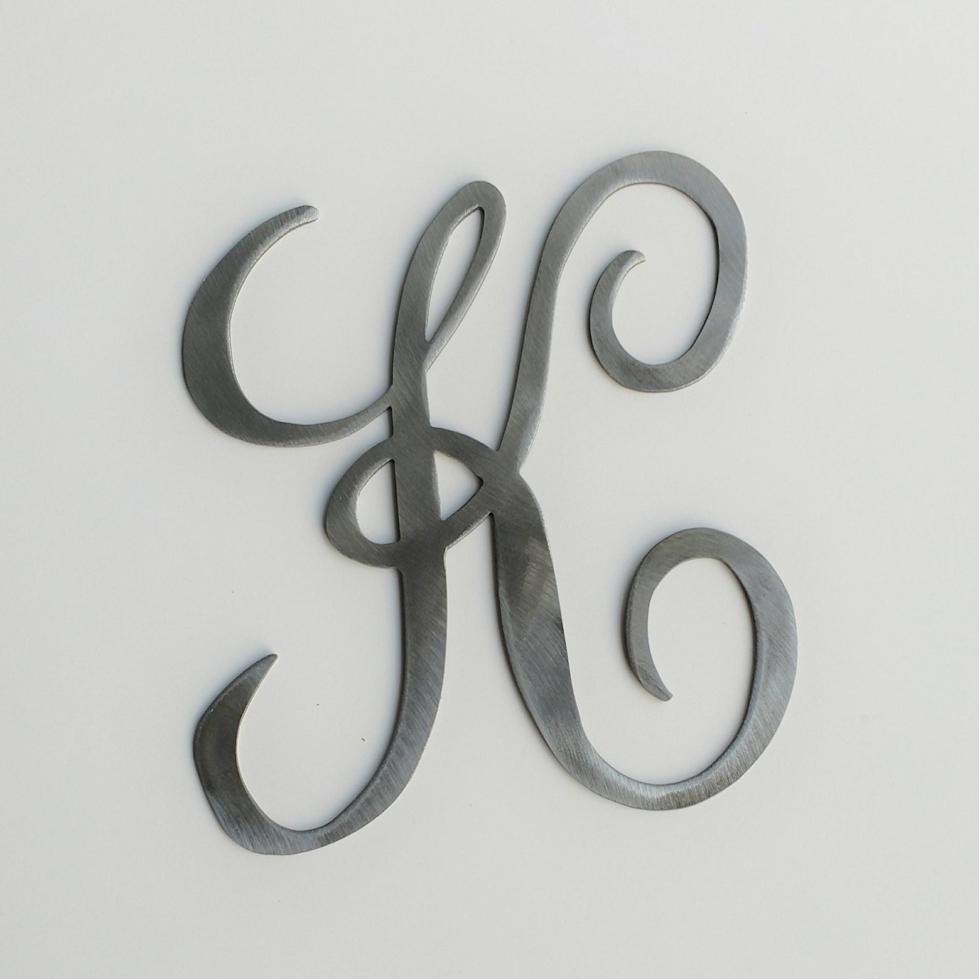 The letter K cursive monogram letter